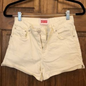 Solid & Striped white high waisted jean shorts.